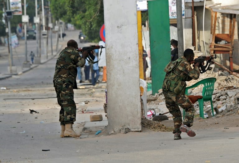 Somali security forces intervene after a car bomb attack claimed by Al-Qaeda-affiliated Shabaab militants, exploded and killed at least 5 people, on the Naasa Hablood hotel in Mogadishu on June 25, 2016