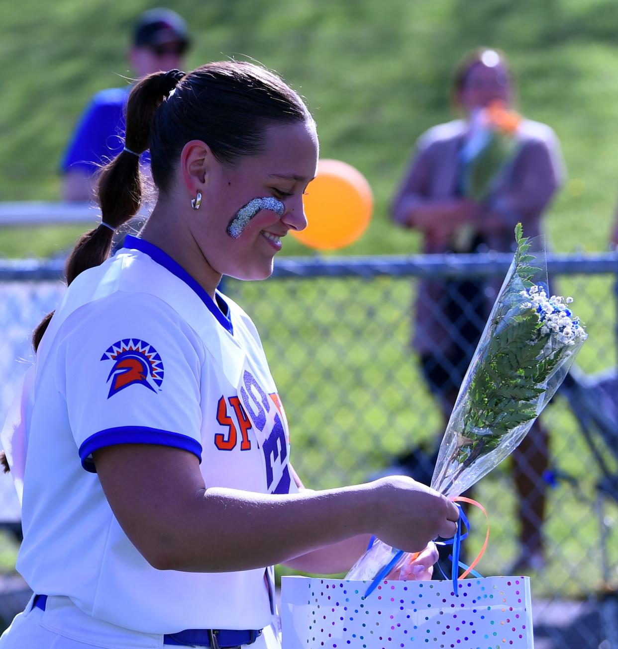 Thomas A. Edison's Gabby Milazzo was among Spartans seniors honored before a 20-1, five-inning win over Elmira Notre Dame in IAC softball May 1, 2024 at Cohen Elementary School's field.