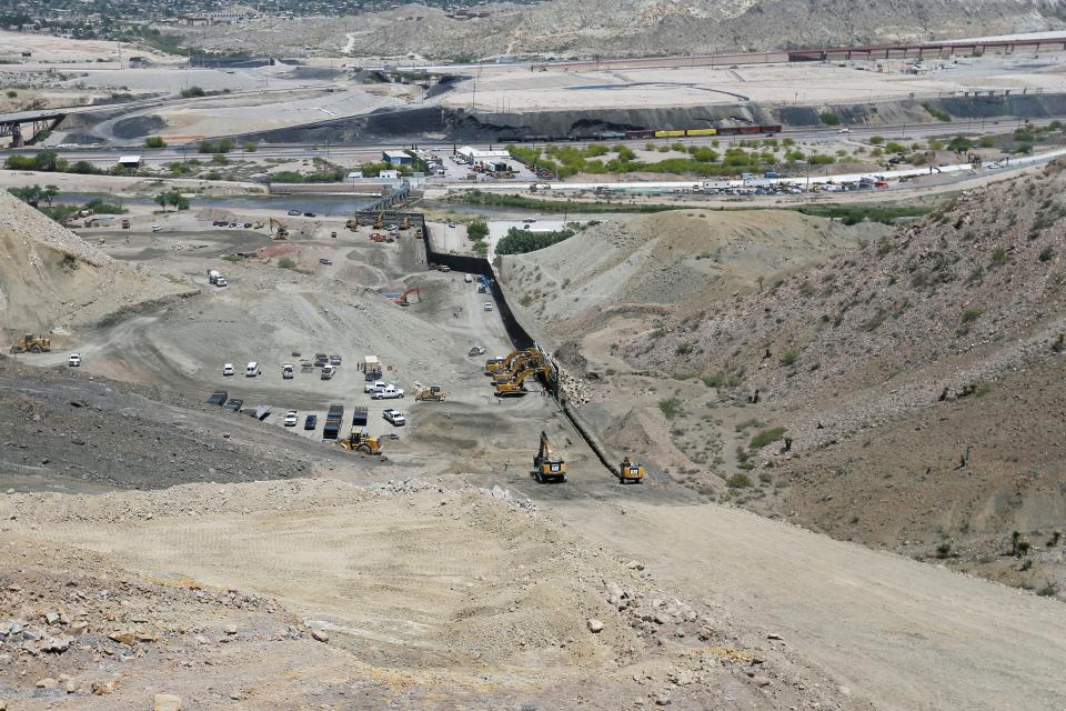 A wall is being built by Monument One, an official marker at the spot where New Mexico, Texas and the Mexican state of Chihuahua converge, by Border Highway West, near Executive Center Boulevard Monday, May 27, by "We Build the Wall" organization on land owned by American Eagle Brick Company.