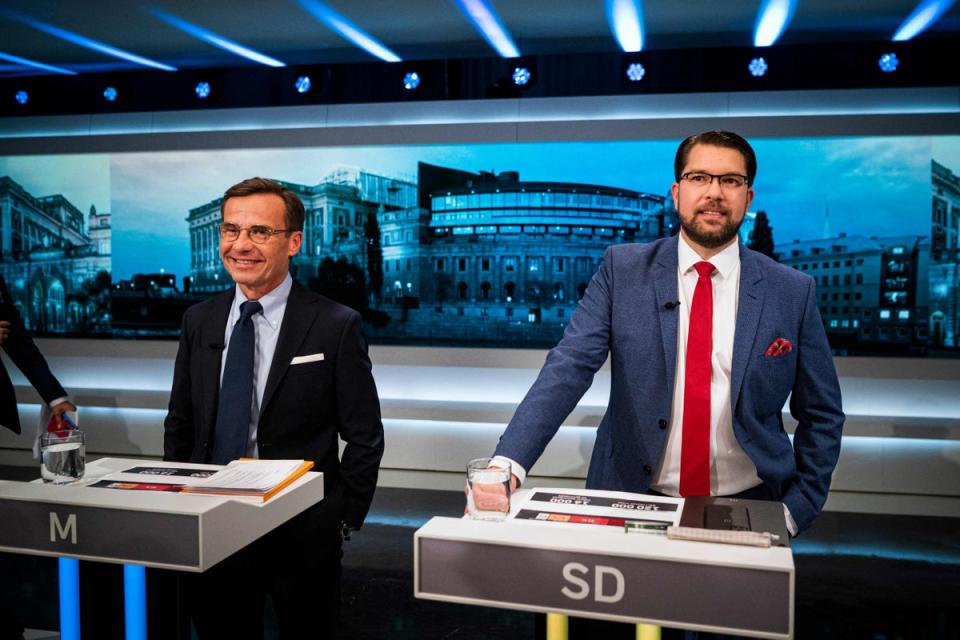 Ulf Kristersson (L), leader of the Moderate Party in Sweden and Jimmie Akesson, leader of the Sweden Democrats party (AFP via Getty Images)