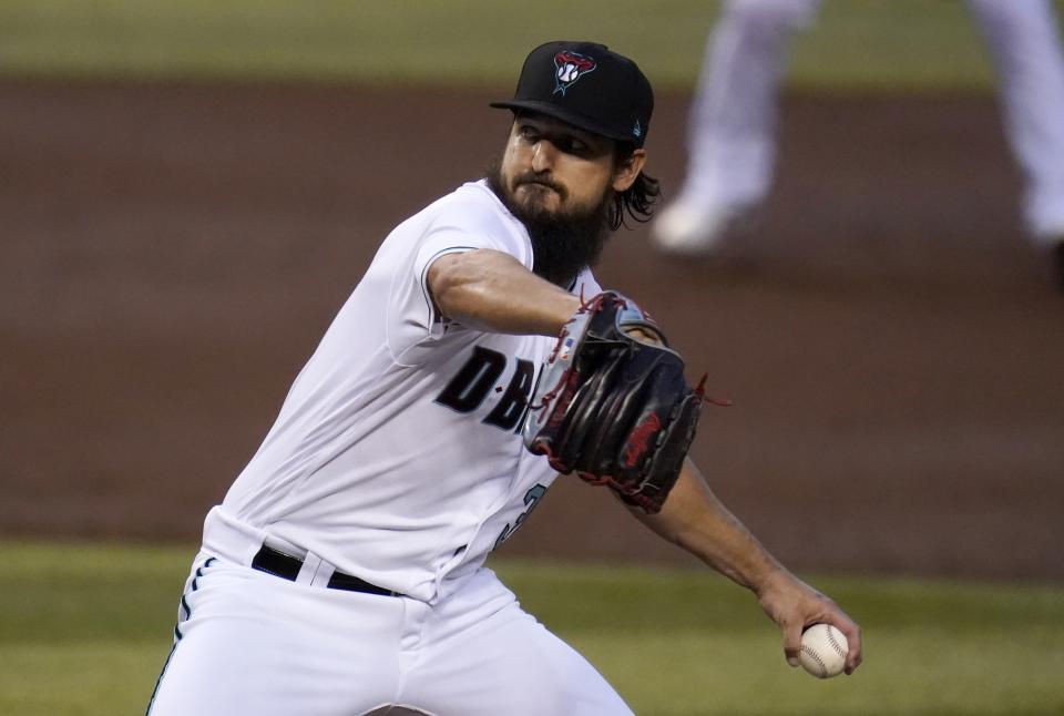 Arizona Diamondbacks starting pitcher Caleb Smith throws a pitch against the Texas Rangers during the first inning of a baseball game Tuesday, Sept. 22, 2020, in Phoenix. (AP Photo/Ross D. Franklin)