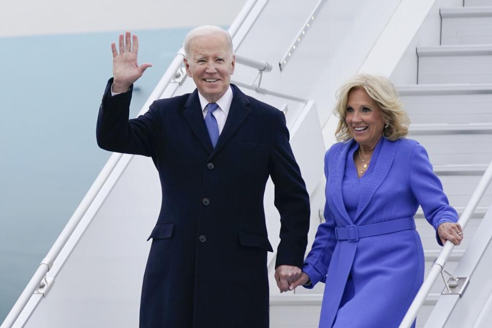 President Joe Biden waves as he and first lady Jill Biden exit Air Force One as they arrive at Ottawa International Airport, Thursday, March 23, 2023, in Ottawa, Canada.