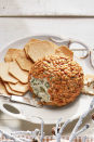 <p>Your appetizer table needs this cheese ball packed with flavorful herbs and coated in crunchy pine nuts.</p><p><strong><a href="https://www.countryliving.com/food-drinks/a29641000/herbed-cheese-ball-recipe/" rel="nofollow noopener" target="_blank" data-ylk="slk:Get the recipe;elm:context_link;itc:0;sec:content-canvas" class="link ">Get the recipe</a>.</strong> </p>