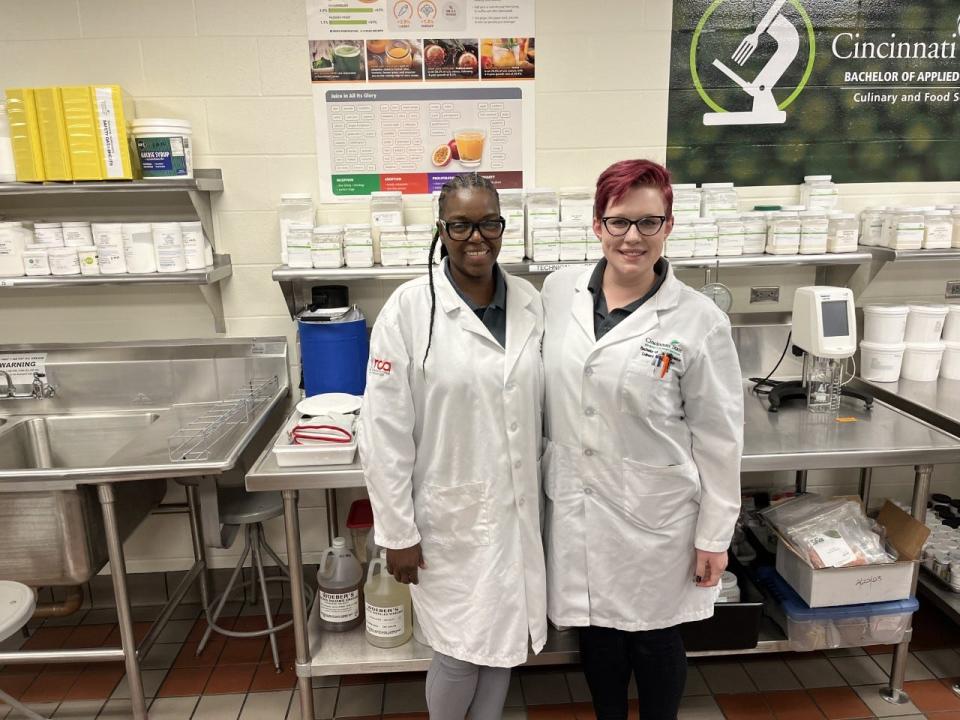 Alicia Manley, left, and Nicole Hatfield, right, are among the first class to receive a bachelor's degree in culinary and food science from Cincinnati State Technical and Community College.