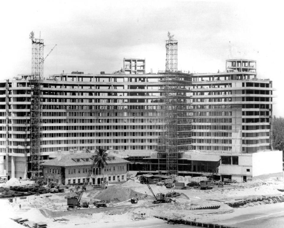 Fontainebleau Hotel under construction in the 1950s, with the Firestone Estate in foreground.