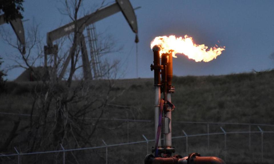 A flare to burn methane from oil production in North Dakota, US.