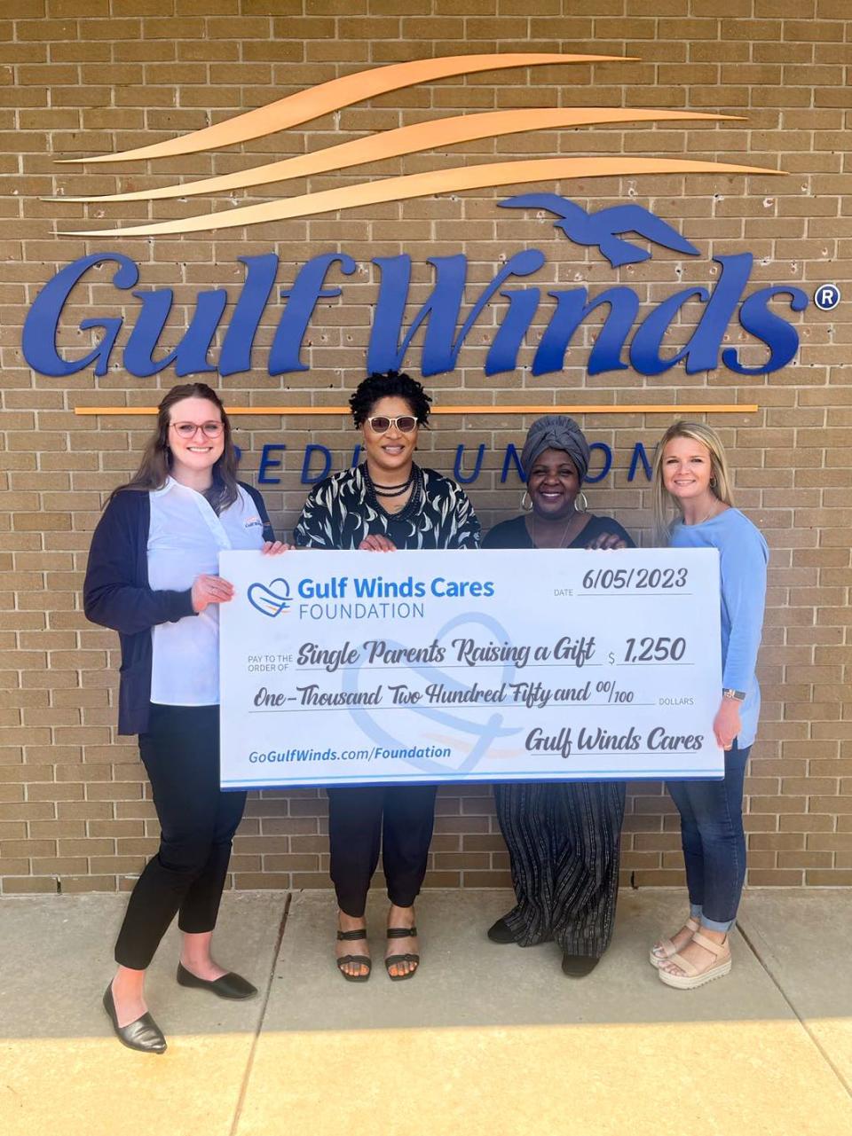 The Gulf Winds Cares Foundation donates $1,250 to Single Parents Raising a Gift.