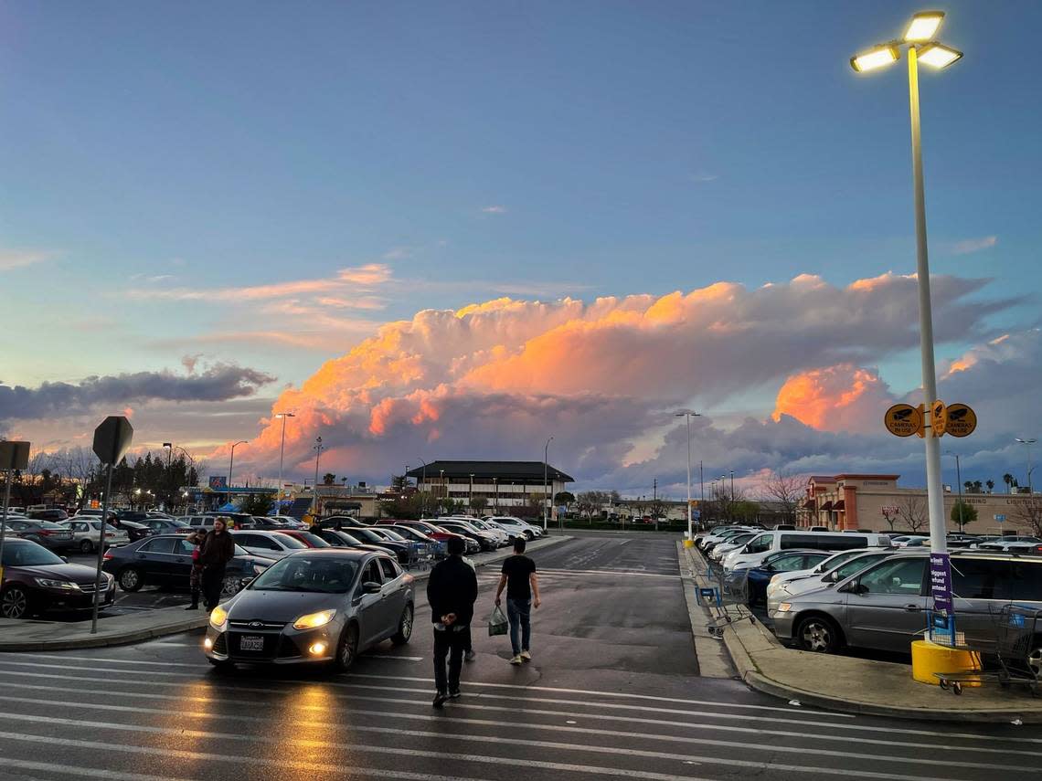 Thunderstorm cloud north of Fresno as seen from a shopping center parking lot in central Fresno on Saturday evening.