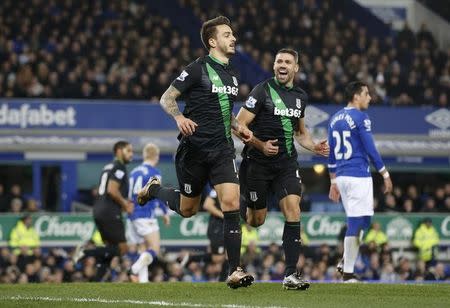 Football Soccer - Everton v Stoke City - Barclays Premier League - Goodison Park - 28/12/15 Stoke's Joselu celebrates scoring their third goal with Jonathan Walters Action Images via Reuters / Carl Recine