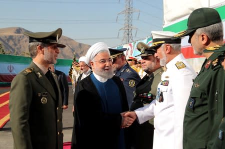 Iranian President Hassan Rouhani attends the unveiling ceremony for the mobile Bavar-373 system in Tehran