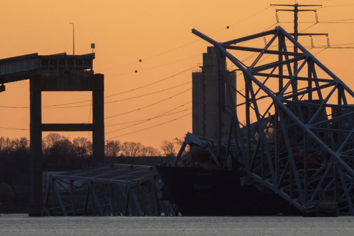 The sun sets on the Francis Scott Key Bridge on Mar 28, 2024, a major span over the Patapsco River in Baltimore that collapsed after it was struck by a large cargo ship.