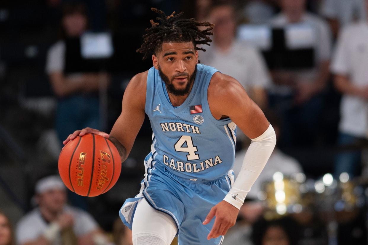 North Carolina guard RJ Davis surveys as he dribbles Sunday at Georgia Tech.