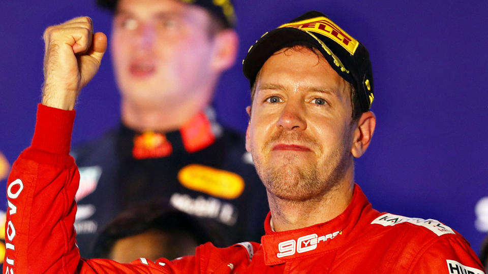 Pictured here, Sebastian Vettel celebrates after the Singapore GP.