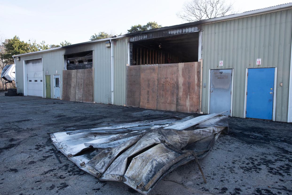 Scene of a fire located off Great Western Road in South Dennis on Tuesday in a set of metal work bays. Harwich residents in the area were given a water advisory because of runoff from the fire.