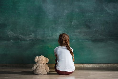 <span class="caption">Our study is the first to show that childhood maltreatment, at least in part, causes poorer mental health. </span> <span class="attribution"><a class="link " href="https://www.shutterstock.com/image-photo/little-autistic-girl-teddy-bear-sitting-1098551924" rel="nofollow noopener" target="_blank" data-ylk="slk:Master1305/ Shutterstock;elm:context_link;itc:0;sec:content-canvas">Master1305/ Shutterstock</a></span>