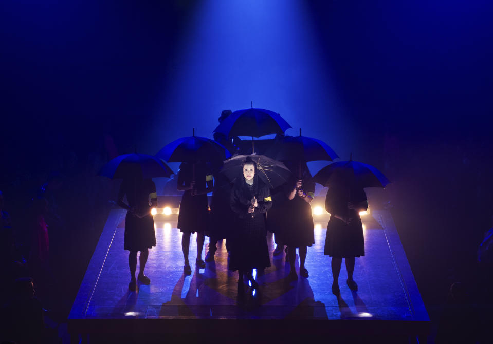 This image released by Boneau/Bryan-Brown shows Lea Salonga as Aurora Aquino, center, during a performance of "Here Lies Love," opening July 20 at the Broadway Theatre in New York. (Boneau/Bryan-Brown via AP)