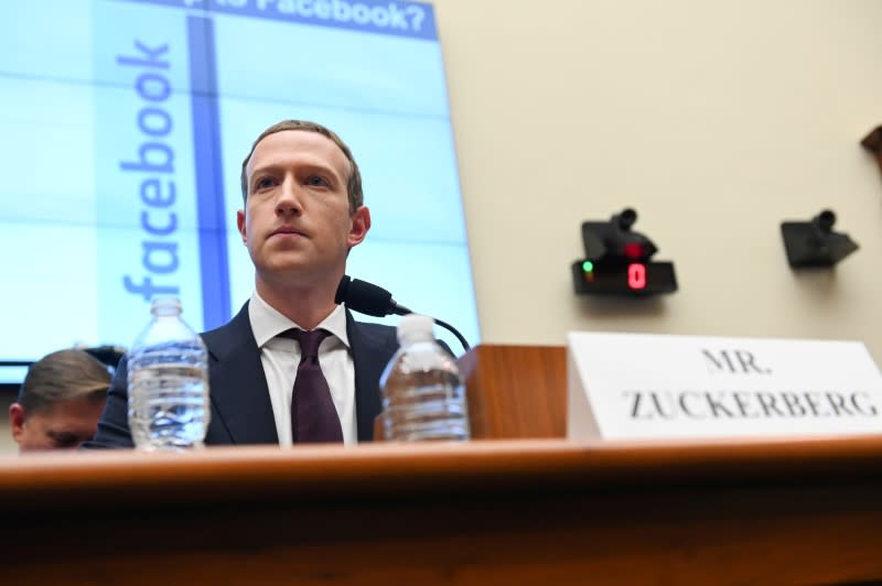 FILE PHOTO: Facebook Chairman and CEO Zuckerberg testifies at a House Financial Services Committee hearing in Washington