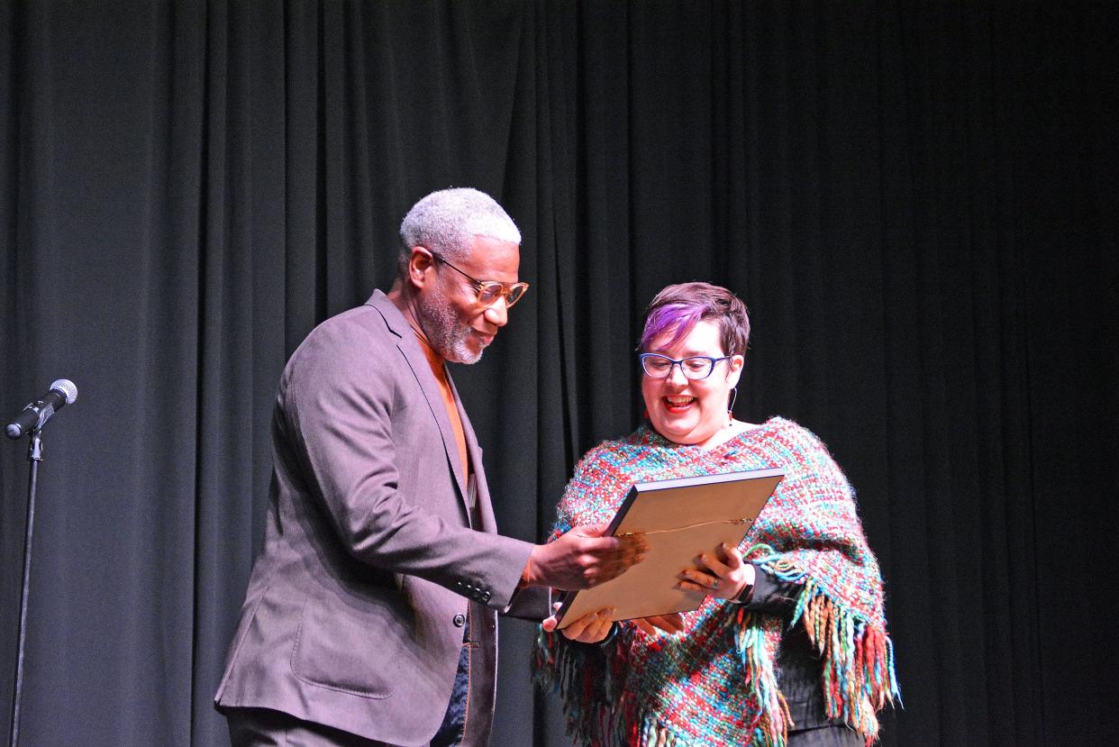 Dr. Lester Woods Jr. accepts the individual diversity award Thursday from Columbia Mayor Barbara Buffaloe during the Columbia Values Diversity breakfast, celebrated in recognition of those who exemplify the teachings of Dr. Martin Luther King Jr. 