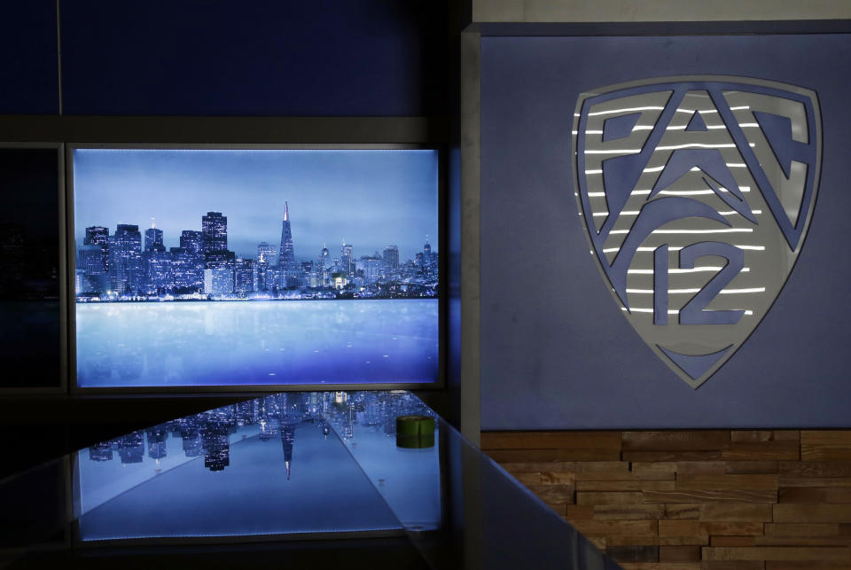 FILE - In this July 17 2012, file photo, an image of the San Francisco skyline is projected in the main studio of the Pac-12 television network in San Francisco. The Pac-12 is launched its own TV network this season, following a template set up by the Big Ten in 2007 that has yielded millions of dollars for its teams during the past five years.(AP Photo/Marcio Jose Sanchez, File)