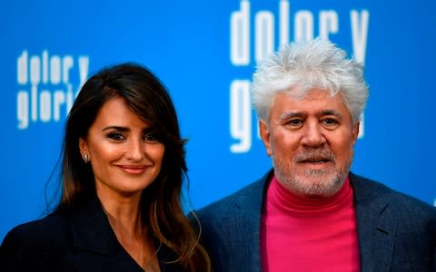 Director Pedro Almodovar and Penelope Cruz during the photocall for Pain and Glory - Credit: GABRIEL BOUYS/AFP