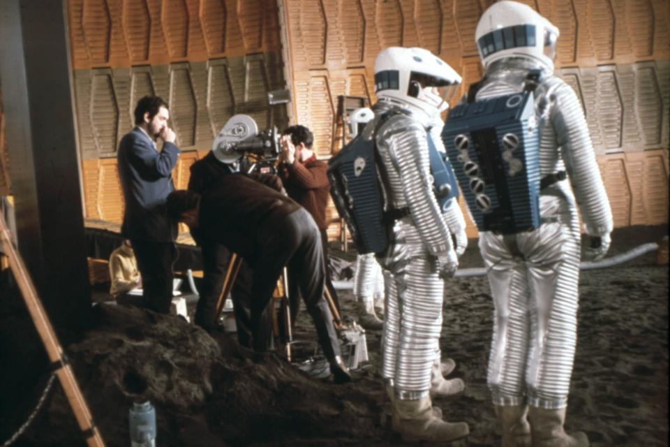 Stanley Kubrick (far left) directing <em>2001: A Space Odyssey</em>. (Warner Bros. c/o Everett Collection)