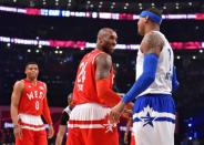 Feb 14, 2016; Toronto, Ontario, CAN; Western Conference forward Kobe Bryant of the Los Angeles Lakers (24) greets Eastern Conference player Carmelo Anthony of the New York Knicks in the first half of the NBA All Star Game at Air Canada Centre. Mandatory Credit: Bob Donnan-USA TODAY Sports