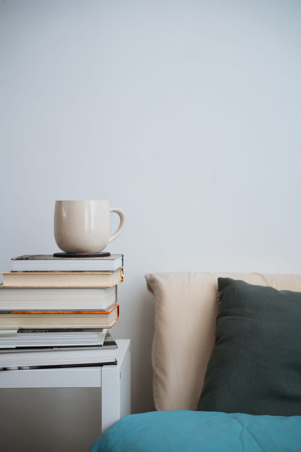 Keep bedside books organized.