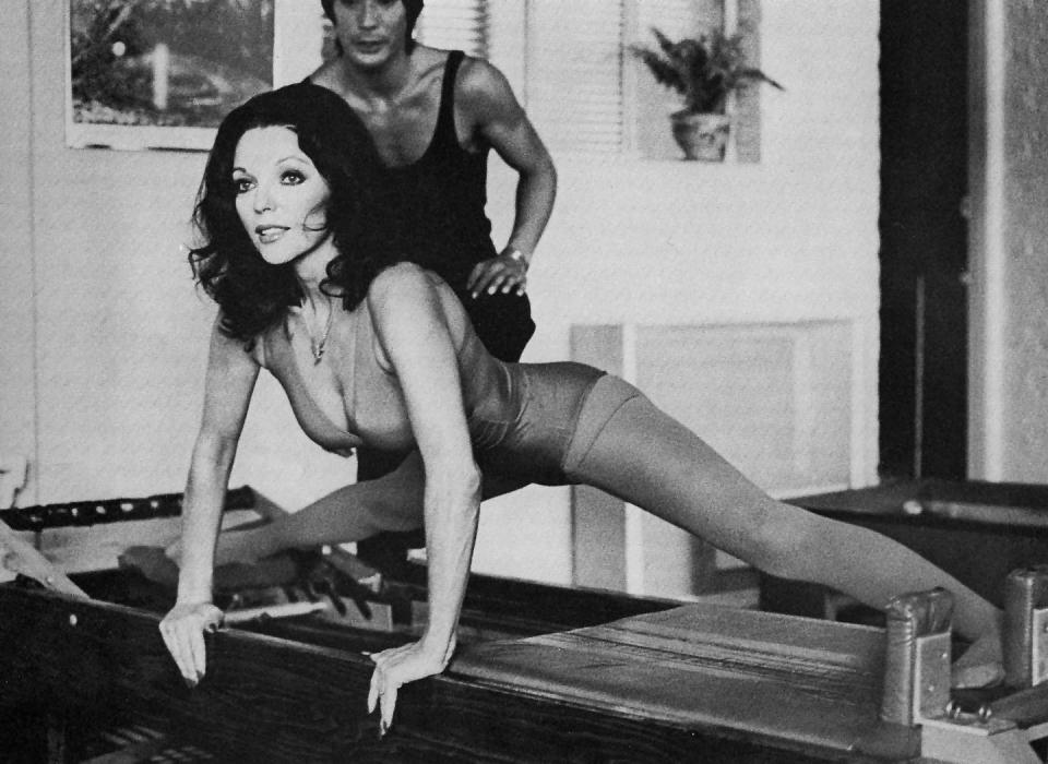 joan collins works out with pilates instructor kim lee in beverly hills, california in 1976