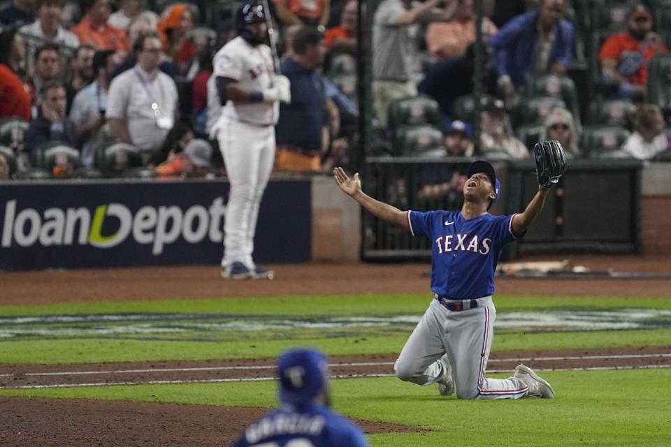 Texas Rangers relief pitcher Jose Leclerc reacts after Game 7 of the baseball AL Championship Series against the Houston Astros Monday, Oct. 23, 2023, in Houston. The Rangers won 11-4 to win the series 4-3. (AP Photo/Tony Gutierrez)