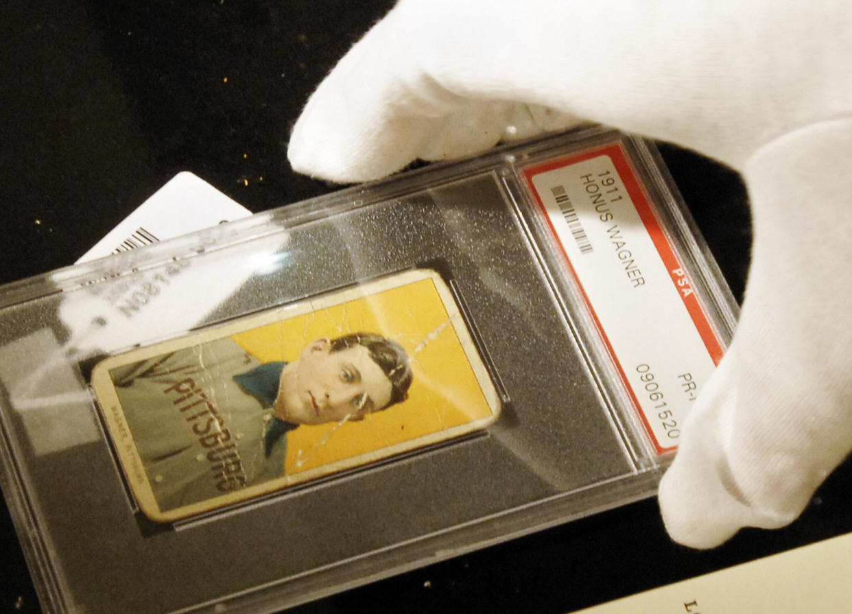 A rare Honus Wagner card has sold for $1.4 million, a record amount for a card in poor condition. (STAN HONDA/AFP/Getty Images)