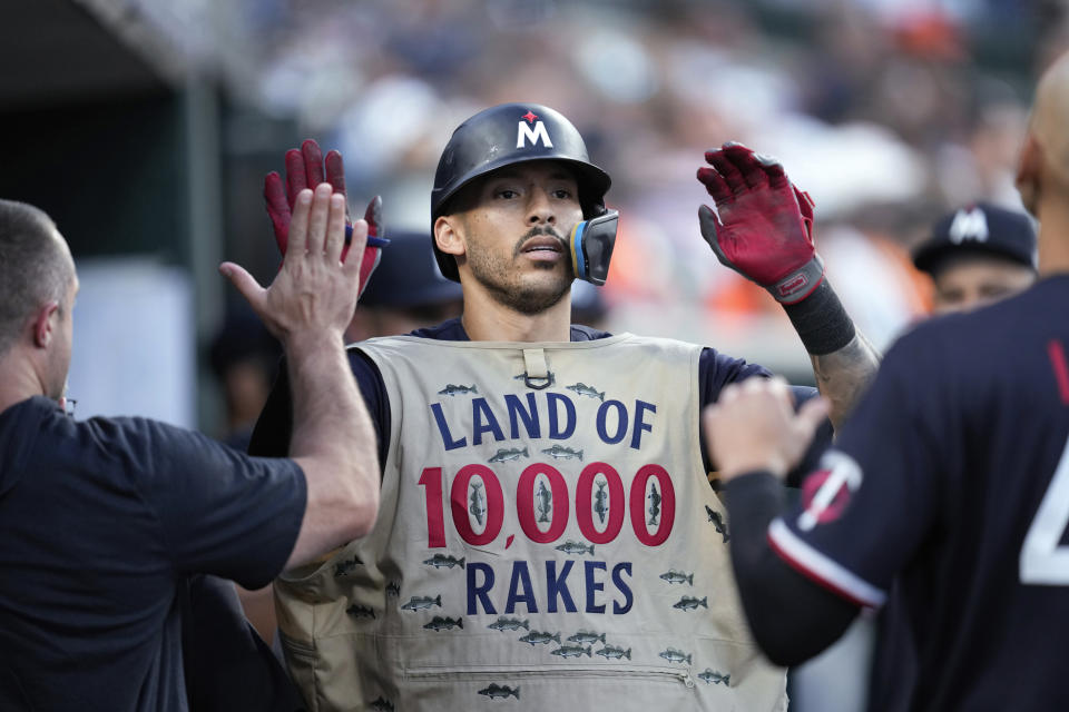 Minnesota Twins' Carlos Correa celebrates his home run against the Detroit Tigers in the sixth inning of a baseball game, Saturday, June 24, 2023, in Detroit. (AP Photo/Paul Sancya)