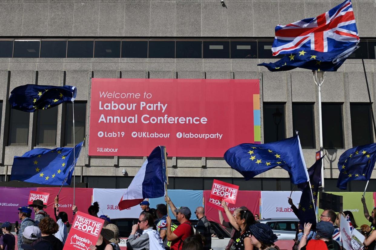 Police are investigating a banner hung outside the Labour Party conference, which is taking place in Brighton: AFP/Getty Images