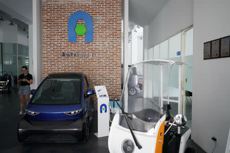 Electric cars are seen in a workshop of Automagic in Hangzhou, Zhejiang province, China September 26, 2018. REUTERS/Aly Song/Files