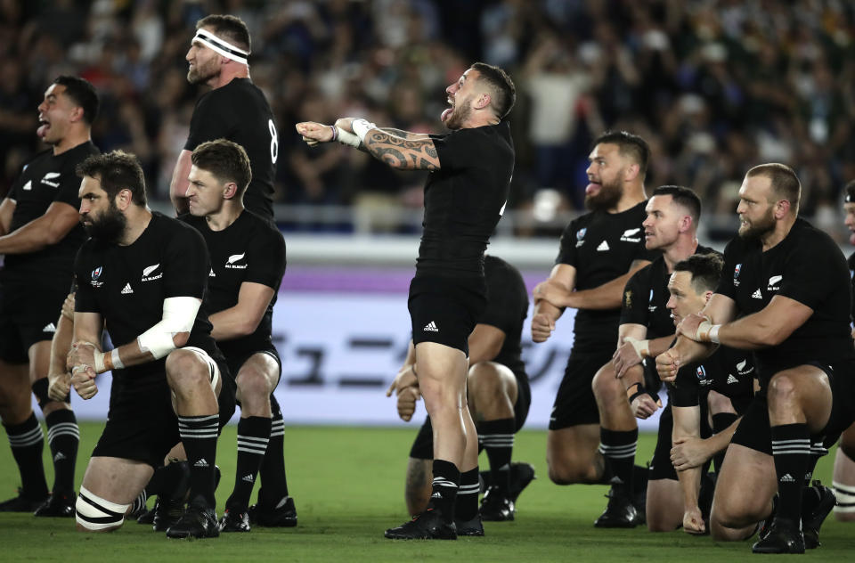 The All Blacks perform a haka ahead of the Rugby World Cup Pool B game at International Stadium between New Zealand and South Africa in Yokohama, Japan, Saturday, Sept. 21, 2019. (AP Photo/Jae Hong)