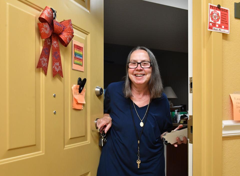 Paula Garavalia stands in the doorway of her one-bedroom apartment. Some seniors at Venetian Walk Senior Apartments in Venice received rent increase notices on their doors last week after a recent HUD adjustment to AMI allowed building managers a higher ceiling for changing rents.  Her rent is rising by $122 a month. She might have to cut her cable or cancel her cremation plan. "I can't afford to die," she said. 