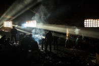 <p>Refugees and migrants, mostly from Pakistan and Afghanistan are seen in an abandoned warehouse near the Central train station in Belgrade, Serbia, Feb. 1, 2017. (Manu Brabo/MeMo) </p>