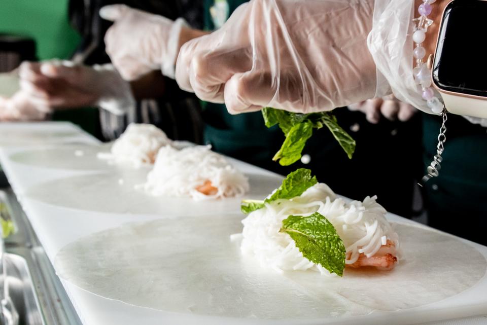 Vietnamese summer rolls are made-to-order during the grand opening of TeaVa Rolls, in Doylestown, on Tuesday, March 19, 2024.