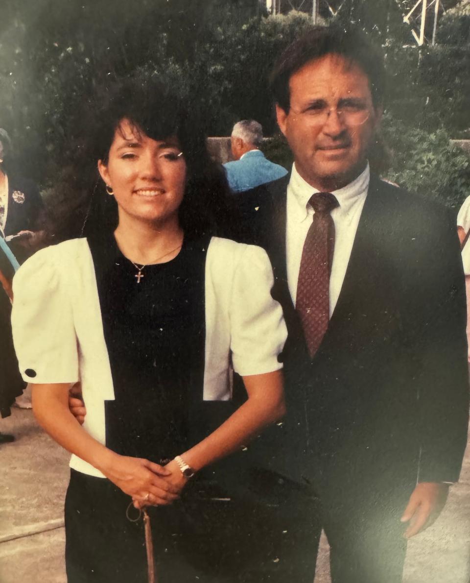 Judge James Blanchard poses with his daughter, Becca, at her graduation from Auburn University.