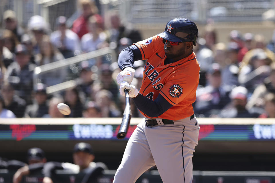 Houston Astros' Yordan Alvarez (44) hits the ball during the first inning of a baseball game against the Minnesota Twins, Saturday, April 8, 2023, in Minneapolis. (AP Photo/Stacy Bengs)