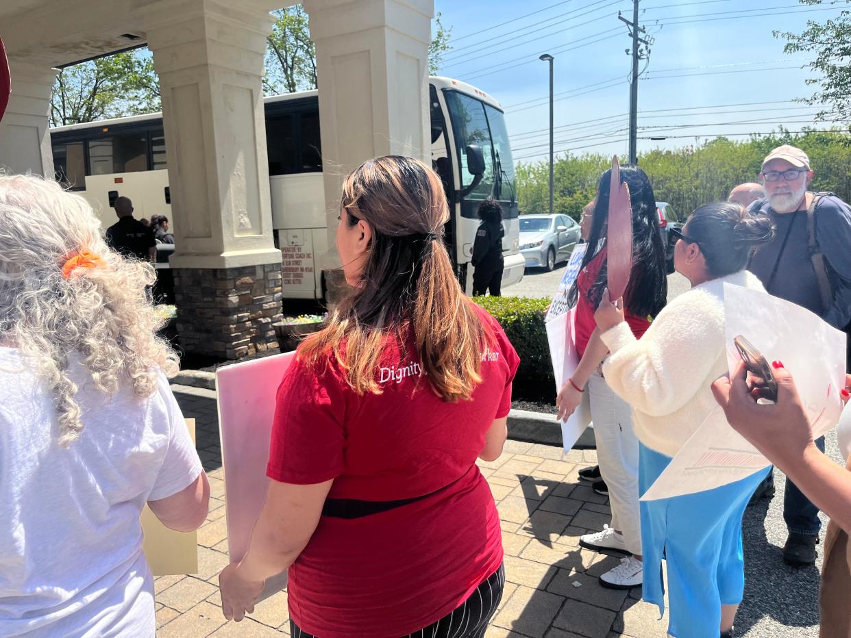Members of grassroots organization For the Many and local elected officials greeted two buses of asylum seekers at Newburgh’s Crossroads Hotel on May 11, 2023. They were joined by other organizers, including those from the Workers Justice Center of New York and the New York Civil Liberties Union.