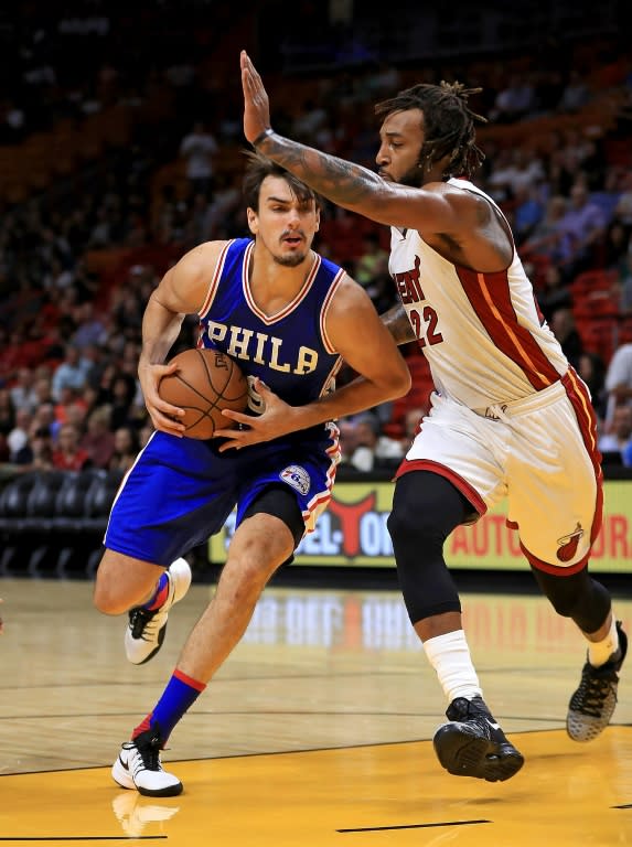 Dario Saric (L), along with fellow newcomers Ben Simmons and Joel Embiid, hopes to help the Philadelphia 76ers get over their dismal last season