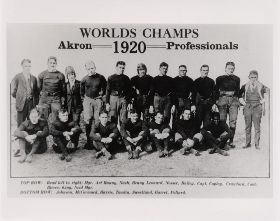 Fritz Pollard, sitting front row right, led the Akron Pros to a championship title in 1920.