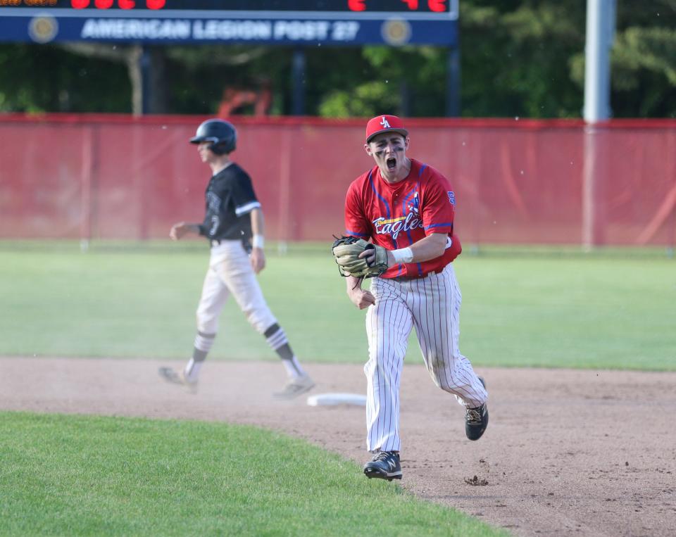 South Bend Adams Drew Stultz (10) celebrates after a double play during Monday’s 4A Baseball Sectional Final against LaPorte at Centennial Park in Plymouth.