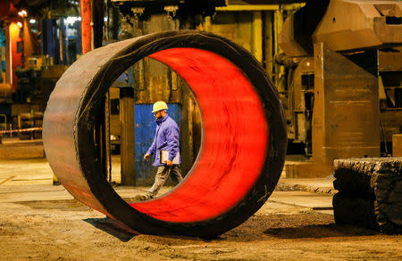 FILE PHOTO:A worker walks in the foundry at the Areva Creusot Forge site in Le Creusot, France, January 11, 2017. REUTERS/Robert Pratta/File Photo