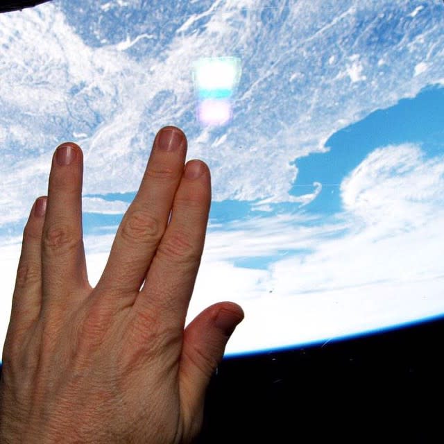 NASA astronaut Terry Virts took this image from the International Space Station in 2015 to honor Leonard Nimoy, who had recently died. The gesture is one of many astronaut connections to "Star Trek."