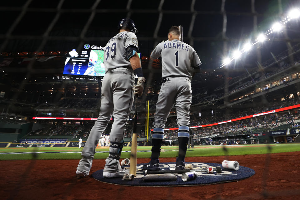 ARLINGTON, TX - OCTOBER 21: Kevin Kiermaier #39 and Willy Adames #1 of the Tampa Bay Rays look on from the on deck batting circle in the second inning during Game 2 of the 2020 World Series between the Los Angeles Dodgers and the Tampa Bay Rays at Globe Life Field on Wednesday, October 21, 2020 in Arlington, Texas. (Photo by Alex Trautwig/MLB Photos via Getty Images)