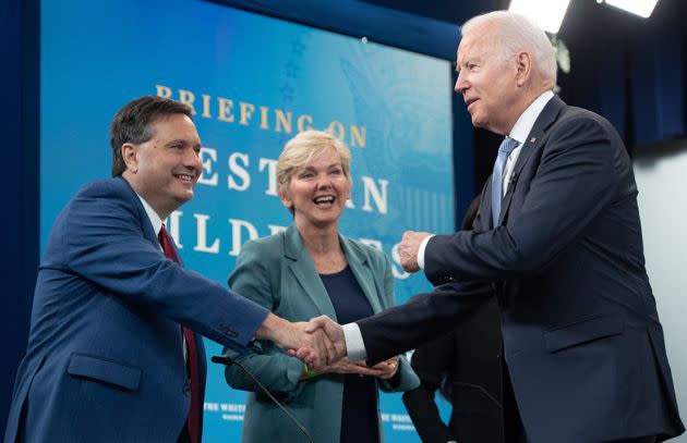 President Joe Biden (right) and Energy Secretary Jennifer Granholm (center) have pursued a dual track of clean energy incentives and short-term efforts to increase oil and gas production. (Photo: SAUL LOEB/Getty Images)