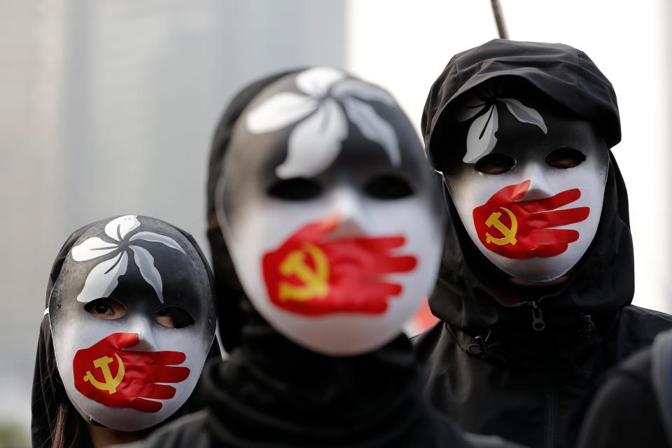 People rally in support for Uighurs in Hong Kong in December 2019.