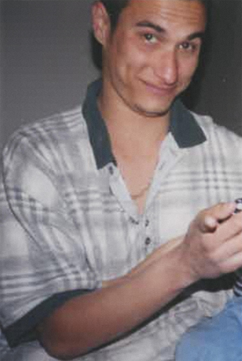 This undated photo provided by Jean Lawniczak in May 2019 shows her late son, John Orlando. A fight led to his 2016 arrest on charges of public drunkenness and assault. The 41-year-old, who suffered from schizophrenia, was suicidal when he arrived at Allegheny County Jail in Pennsylvania, court records say. At intake, he declared he was high on recreational drugs and screamed, "I hope I die in here.” Orlando was left unsupervised long enough to construct a noose out of materials in his cell. He hanged himself from his bunk and died in the hospital. Lawniczak and her granddaughter used to visit Orlando’s grave together, until the girl told her that it "hurt her heart too much." (Jean Lawniczak via AP)