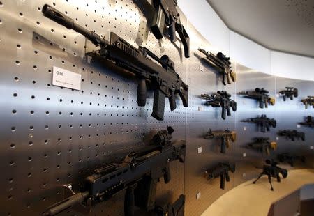 HK G 36 (L) guns are pictured at a show room of arms manufacturer Heckler & Koch during a guided media tour at Heckler & Koch headquarters in Oberndorf, 80 kilometers southwest of Stuttgart, Germany, May 8, 2015. REUTERS/Ralph Orlowski